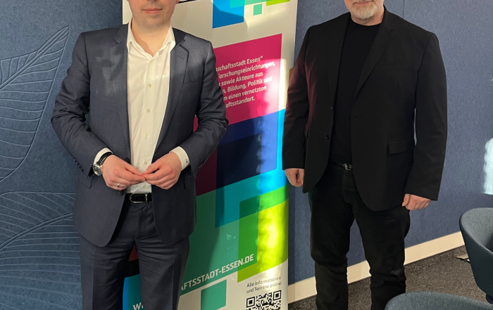 Der scheidende und der neu gewählte Vorstandsvorsitzende der Initiative Wissenschaftsstadt Essen bei der Vorstandssitzung